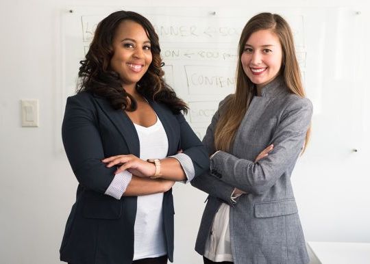 two women standing together
