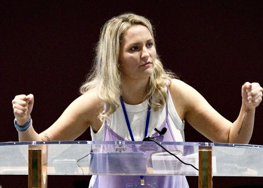 Mary at pulpit preaching